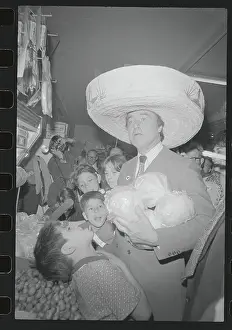 Sargent Shriver Carrying Lettuce