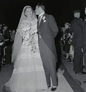 Sargent Shriver Kissing His Bride