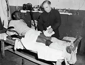 Pack Prints: Satchel Paige With Ice Pack on His Leg