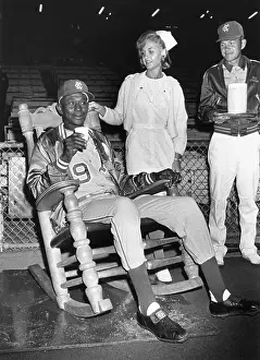 Satchel Paige in a Rocking Chair at a Game