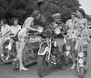 Sexy Prints: Scantily Clad Women Surrounding Traffic Cop