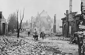 Scarce Pedestrians on War Torn Street