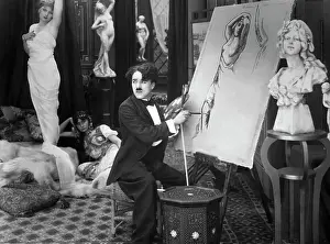 Prints of (Original Caption). Charlie Chaplin as The Artist in the 1914 film The Face on the Bar Room Floor Master of Mime, Icon of Cinema: Chaplin in Prints: Scene from The Face on the Bar Room Floor