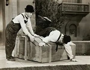 Prints of Stan Laurel and Oliver Hardy in a scene from the 1932 MGM short film, The Music Box Timeless Comedy Icons: Classic Moments from the Legendary Duo: Scene from The Music Box