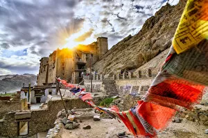 Indian Culture Gallery: Scenic of leh palace with colorful omani prayer flag with dramatic sky in leh ladakh, india