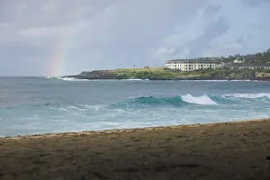 Scenic rainbow over Shipwreck Beach, Kauai, Hawaii, USA