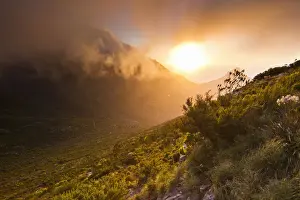 Devils Peak Prints: Scenic sunset over Table Mountain and Lions Head as seen from a hiking trail up Devils Peak