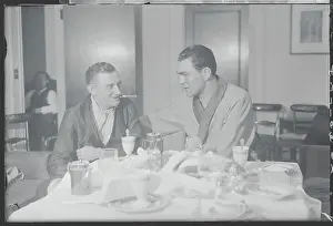 Hospitality Prints: Schmeling, Right, Enjoying Dinner With His Manager