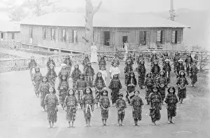Schoolgirls Posing in Front of Their School