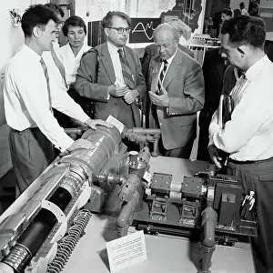 Scientist at Atomic Energy Conference Exhibit