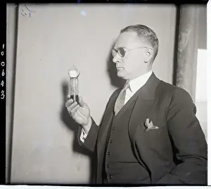 Tube Prints: Scientist with Tube Which Controls Electric Current