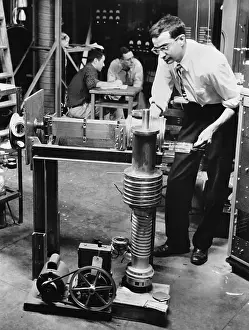 Scientist Working on Laser Atomic Clock Research