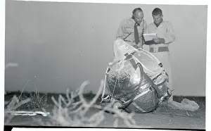 Paul Prints: Scientists Checking a Plastic Balloon