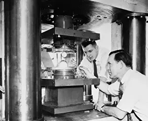 Scientists Operating a Device Used to Make Diamonds