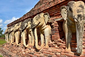 Images Dated 30th November 2015: sculptures of elephants at Wat Sorasak Sukhothai temple Thailand, Asia
