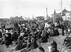 Prints of circa 1895: Wearing hats and warm clothing a crowd, mainly of children, sit on stony Southsea beach looking out to sea. (Photo by F J Mortimer/Getty Images) Francis James Mortimer (1874-1944) Prints: Sea Side Crowds