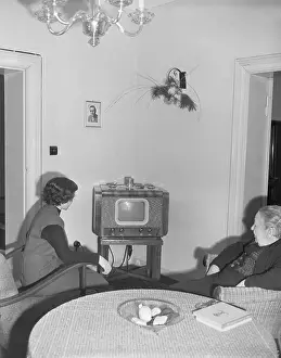 Cold War Prints: Seated Women Watch Tv In Room W/Table