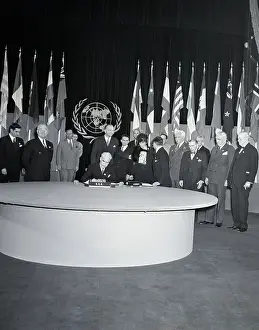 Sec.Of State Stettinus Signs; Truman