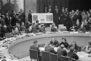 General Assembly Building Prints: Security Council Delegates Examining Photographs