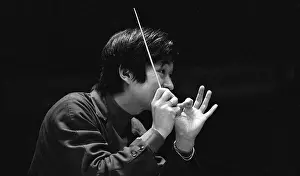 Seiji Ozawa Using Arms to Conduct Orchestra