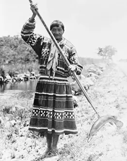 Seminole Man Using a Spear to Fish