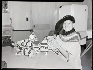 Seminole Woman Working With Dolls
