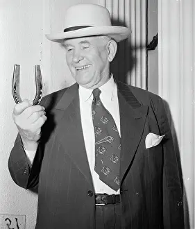 Sen. Alben W. Barkley Holding a Horseshoe