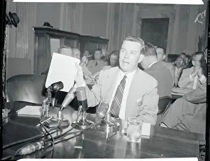 Senate Investigator with Document