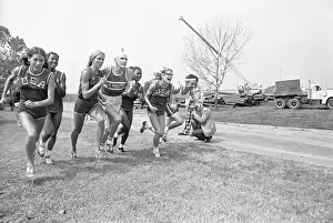 Member Of Congress Prints: Senator Alan Cranston and Representative Byron running with members of US Olympic team