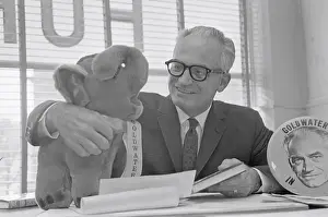 Senator Barry Goldwater Cuddling a Stuffed Elephant