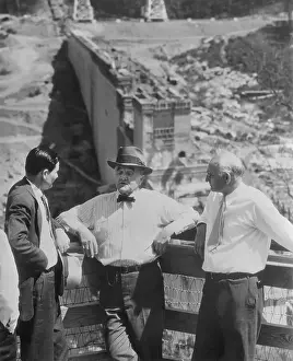Senator and Dam Official Conversing for Press Release