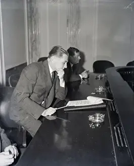 Hand On Chin Prints: Senator Gerald Nye Reading a Report