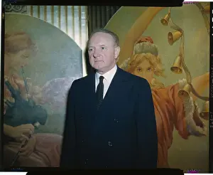 Senator Harry Bird Standing in Front of Mural