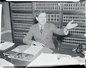 Former Senator Huey P. Long Gesturing at His Desk