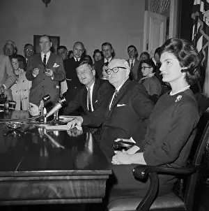 Senator John F. Kennedy Signing Documents