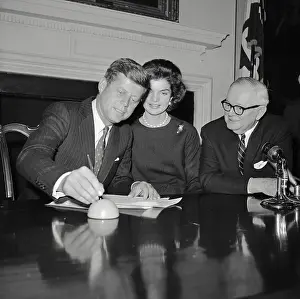 Senator John F. Kennedy Signing Documents