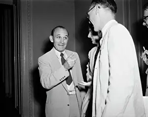 Fingers Prints: Senator John McClellan Talking to Reporters