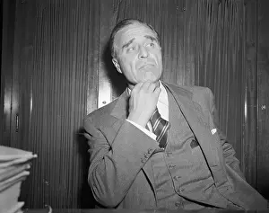 Senator Prescott Bush Adjusting His Necktie