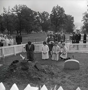 Senator Robert Kennedy Kneeling at Grave