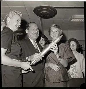 Missile Prints: Senator and two Women Holding Missile Model