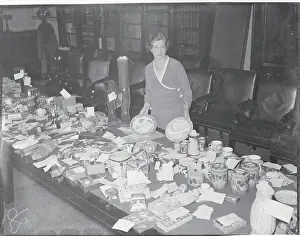 Senatorial Secretary at Table of Housewares