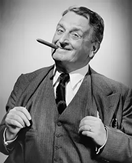 Enjoyment Prints: Senior man with cigar in mouth, (B&W), portrait