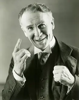 One Senior Man Only Prints: Senior man gesturing, portrait