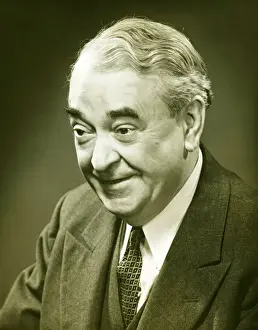 Well Groomed Prints: Senior man posing in studio, (B&W), close-up, portrait