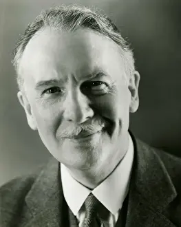 One Senior Man Only Prints: Senior man in full suit smiling, (B&W), portrait