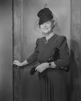 Purse Prints: Senior woman wearing hat, portrait