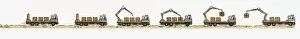 Crane Gallery: Sequence of illustrations of unloading crane removing cargo containers from truck