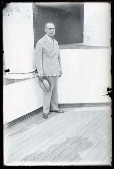 Serge Koussevitzky Standing and Holding His Hat