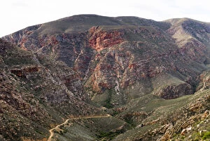 Serpentine road, gravel road, Swartberg Pass, Swartberg Mountains, Western Cape Province, South Africa
