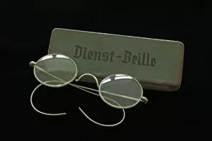 Images Dated 18th August 2014: Service glasses from 1938 with a sheet metal case on black